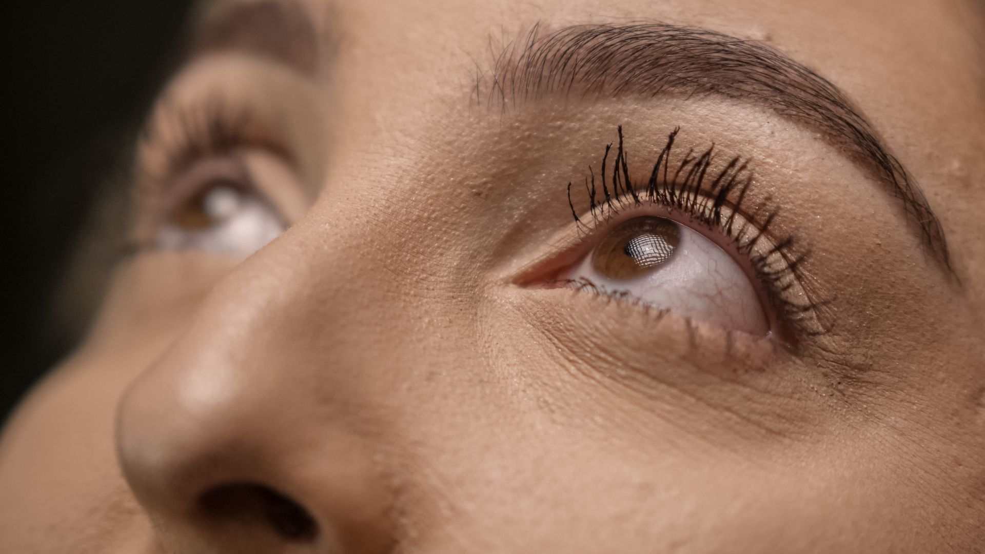 Extreme Close Up Photo of Person Looking Up