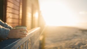 Person Holding a Cup of Coffee