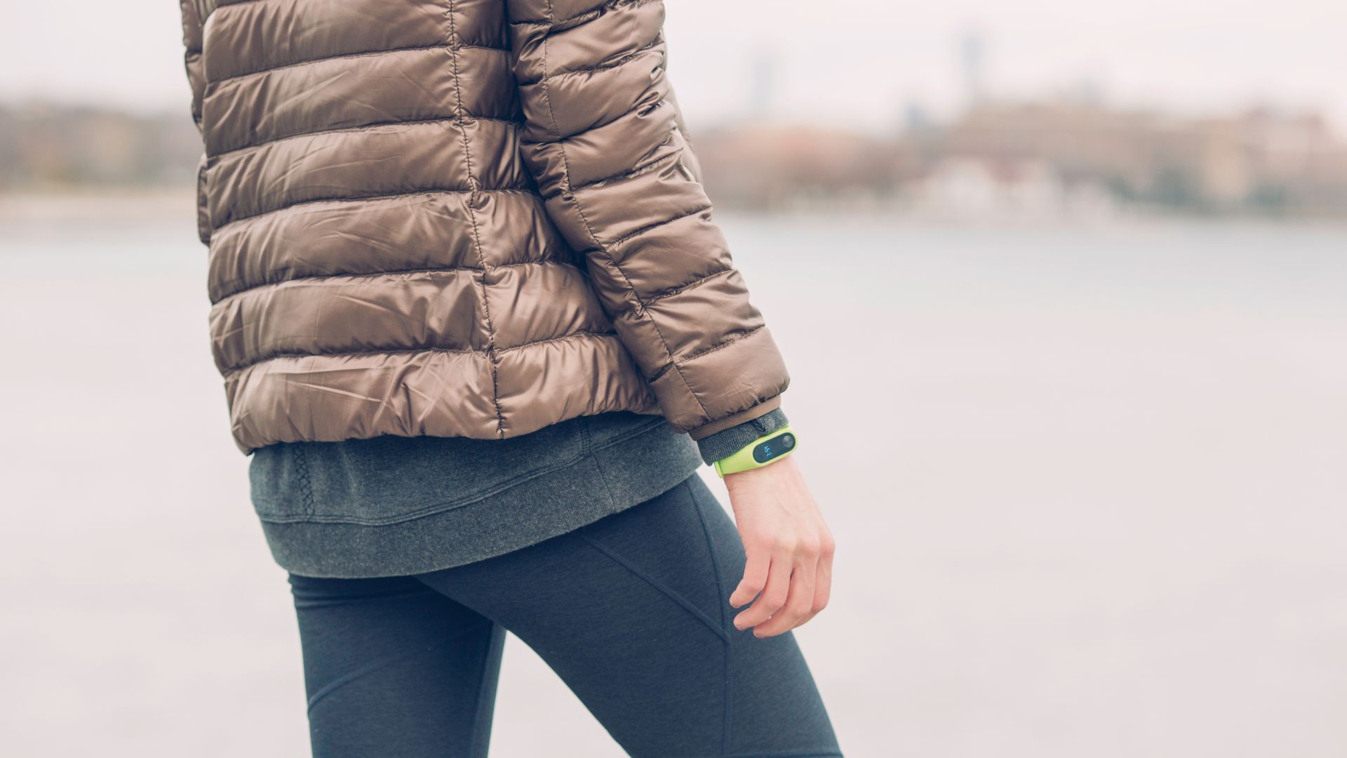 Person Wearing Brown Bubble Jacket