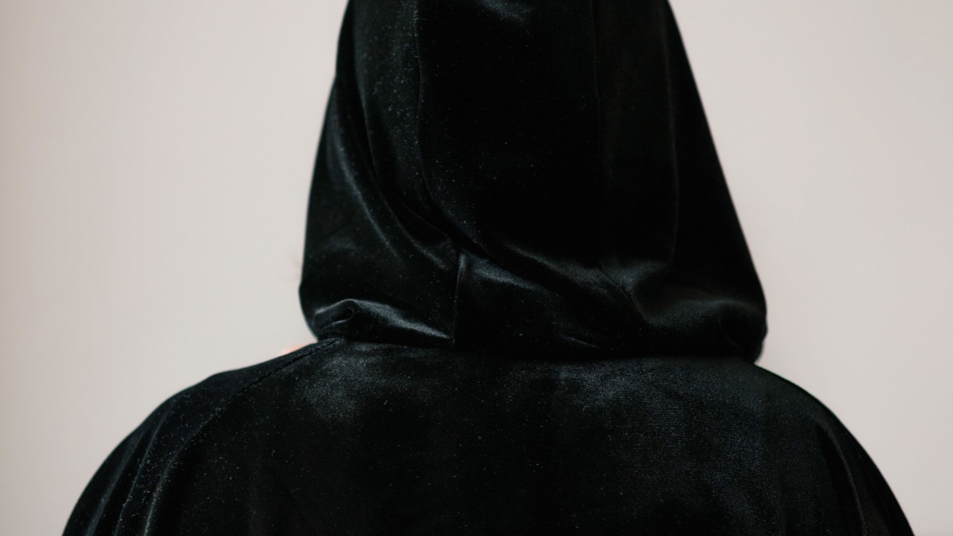 Person in Black Cloak