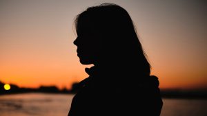 Silhouette of a Woman During Sunset