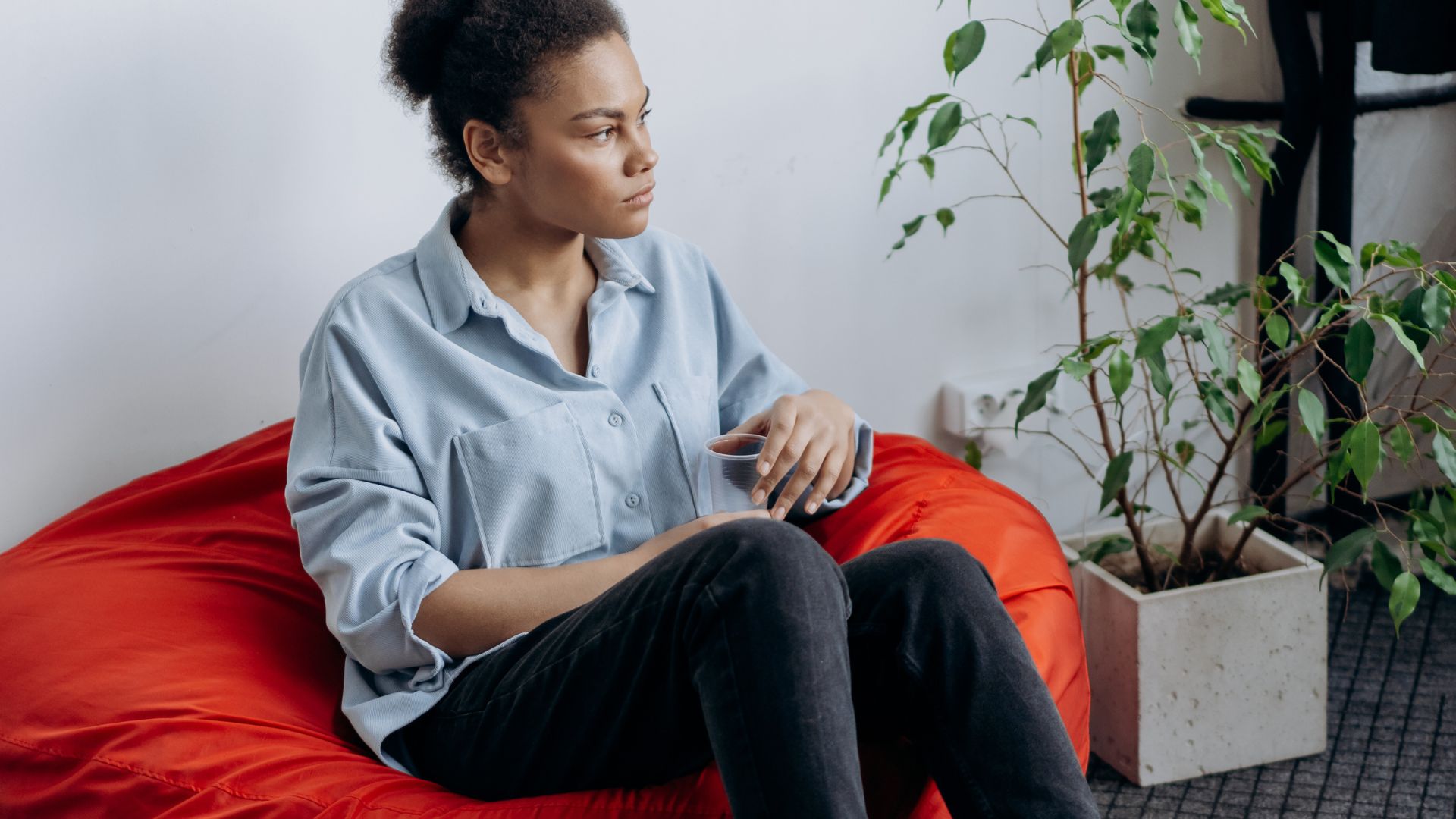 Woman Sitting on a Bean Bag Chair