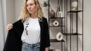 Woman in White Crew Neck Shirt and Black Cardigan