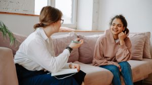 Young Woman Talking with Therapist